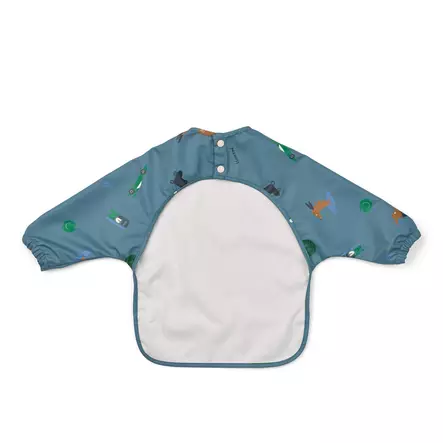 Liewood Merle ruokalappu hihoilla Fun/Beach blue, takana nepparikiinnitys. - Ruokalaput - 18136-2621 - 2