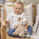 Teddykompaniet Ludde soittorasia koira lapsen syliss=C3=A4. - Mobilet ja soittorasiat - 3091 - 2