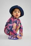 Reima Moomin Viehe UV-hattu Rose pink lapsen päässä. - Uima-asut ja uv-vaatteet - 5300268B-4571 - 2