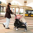 Sadesuoja Stokke YoYo5 rattaissa lapsella. - Sadesuojat vaunuihin ja rattaisiin - 717301 - 2