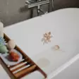 Mushie kylpylelu Water Wheel Toy kiinnittyy imukupilla. - Kylpylelut - 102053 - 2