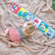 Taf Toys vaunulelu Koala clip on pram book lattialla lapsen vatsallaan=
 olo harjoitteluun. - Vaunulelut - 237708 - 5